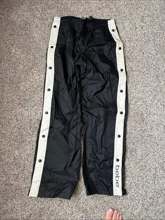 bebe Pants - bebe Black Pants with White Side Stripes and Snap Details